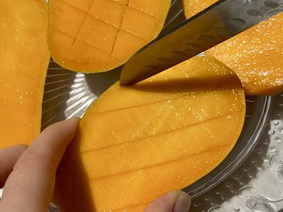 Step 2: Fresh mango diced into chunks and mixed with creamy Greek yogurt in a medium bowl